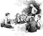 A boy telling a group of boys a story.