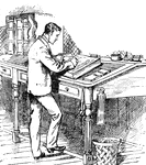 Man standing at a writing desk entering notations into a ledger.