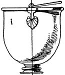 This Graeco-Italic bucket is made out of bronze. It has a ring foot bottom with a hoop handle. It was used to transport water.