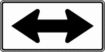The Two-Direction Large Arrow sign shall be a horizontal rectangle. If used, it shall be installed on the far side of a T-intersection in line with, and at approximately a right angle to, approaching traffic. The Two-Direction Large Arrow sign shall not be used where there is no change in the direction of travel such as at the beginnings and ends of medians or at center piers.