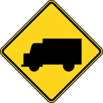 Vehicular Traffic signs may be used to alert road users to locations where unexpected entries into the roadway by trucks, bicyclists, farm vehicles, emergency vehicles, golf carts, horse-drawn vehicles, or other vehicles might occur. The TRUCK CROSSING word message sign may be used as an alternate to the Truck Crossing symbol sign.