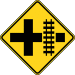 If the distance between the railroad tracks and a parallel highway, from the edge of the tracks to the edge of the parallel roadway, is less than 30 m (100 ft), this sign shall be installed on each approach of the parallel highway to warn road users making a turn that they will encounter a highway-rail grade crossing soon after making a turn, and a <a href="../../68200/68226/68226_488_W10-1_b.htm">Highway-Rail Grade Crossing Advance Warning</a> sign for the approach to the tracks shall not be required to be between the tracks and the parallel highway.