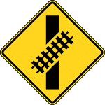 The Skewed Crossing sign may be used at a skewed highway-rail grade crossing to warn drivers that the railroad tracks are not perpendicular to the highway. If the Skewed Crossing sign is used, the symbol should show the direction of the crossing (near left to far right as shown in Figure 8B-5, or the mirror image if the track goes from far left to near right). If the Skewed Crossing sign is used where the angle of the crossing is significantly different than 45 degrees, the symbol should show the approximate angle of the crossing.