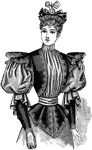 This lady's blouse was designed in the late 19th century. It is tied at the waist.