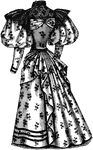 This late 19th Century dress is in a floral pattern with an apron design that drapes in the front.