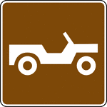 This sign is used to indicate that a trail or road designed for 4 wheeled vehicles is located nearby.