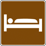 This sign is used to indicate that lodging is located nearby.