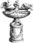 This richly decorated bird bath features four sculpted birds perched along the top. The basin itself as well as the base is accented with flowers and ribbons.