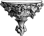 This is an ornate tailpiece decorated with flowers, leaves and vines.