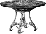 This table top and table was made in Vienna, Austria. Its table top is elaborately designed with inlaid wood of different colors. Its base has legs that are bent in curve design.