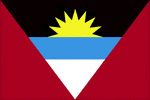 Color flag of Antigua and Barbuda. Red, with an inverted isosceles triangle based on the top edge of the flag; the triangle contains three horizontal bands of black (top), light blue, and white, with a yellow rising sun in the black band.