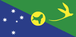 Color flag of Christmas Island. Territorial flag; divided diagonally from upper hoist to lower fly; the upper triangle is green with a yellow image of the Golden Bosun Bird superimposed, the lower triangle is blue with the Southern Cross constellation, representing Australia, superimposed; a centered yellow disk displays a green map of the island.