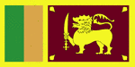 Color flag of Sri Lanka. Yellow with two panels; the smaller hoist-side panel has two equal vertical bands of green (hoist side) and orange; the other panel is a large dark red rectangle with a yellow lion holding a sword, and there is a yellow bo leaf in each corner; the yellow field appears as a border around the entire flag and extends between the two panels.
