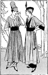 These two ladies are dressed in early 20th century dresses. Both ladies are dressed in long striped dresses with a belt at the waist. They are both also wearing hats.