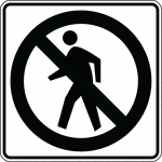 "The No Pedestrian Crossing sign may be used to prohibit pedestrians from crossing a roadway at an undesirable location or in front of a school or other public building where a crossing is not designated."-Federal Highway Administration, 2007
