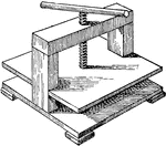 An illustration of a screw press which is a type of machine used to shape or cut metal.