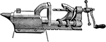 A combination vise, anvil, and drill tool.