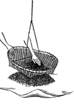 Tea leaves are placed in bamboo baskets that hang from thin twine.