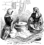 Women grinding grain in a mortar. The hole for receiving the grain was in the center of the upper millstone, and in the operation of grinding the lower stone was filed and the upper stone turned by means of a handle. The meal came out at the edges and was collected on a cloth spread under the mill  on the ground.