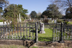 A Burial Plot Surrounded by a Wrought Iron Fence