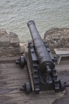 A Cannon Pointing over the Water
