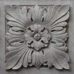 A Carved Panel with a Flower in the Center