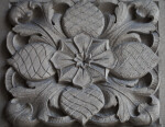 A Carved Panel with a Pine Cone Motif