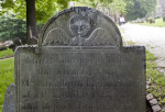 A Cherub on a Shouldered Tablet Headstone