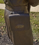 A Close-Up of an Ammunition Pouch on a Bronze Sculpture of a Soldier