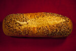 A Closeup of a Loaf of a Seeded Italian Bread