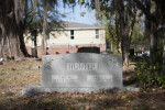 A Die and Base Headstone with Carved Crosses