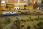 A Diorama of a Disassembled Barge Pulled by a Locomotive