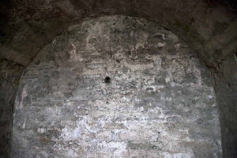 A Hole in a Wall at the End of a Barrel Vault