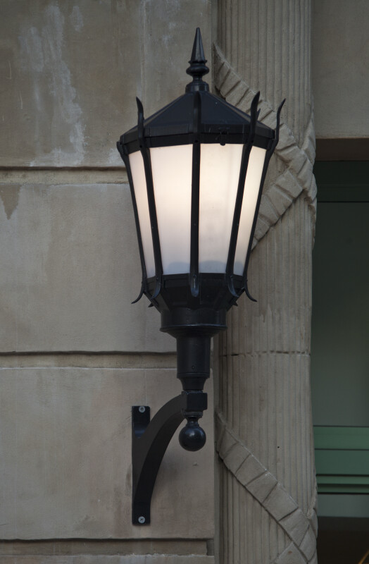 A Light Fixture Mounted on a Building Exterior