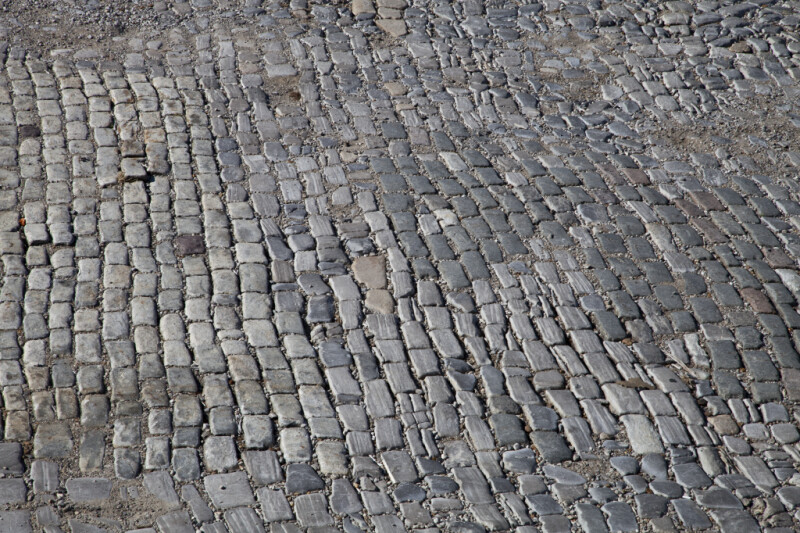 A Loosely-Packed Pavement of Angular Cut Stones