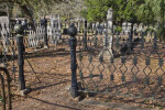 A Metal Fence around a Cemetery Plot