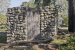 A Rough Stone Building with a Wooden Door