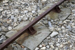 A Rusty Rail Secured in Stone Sleepers