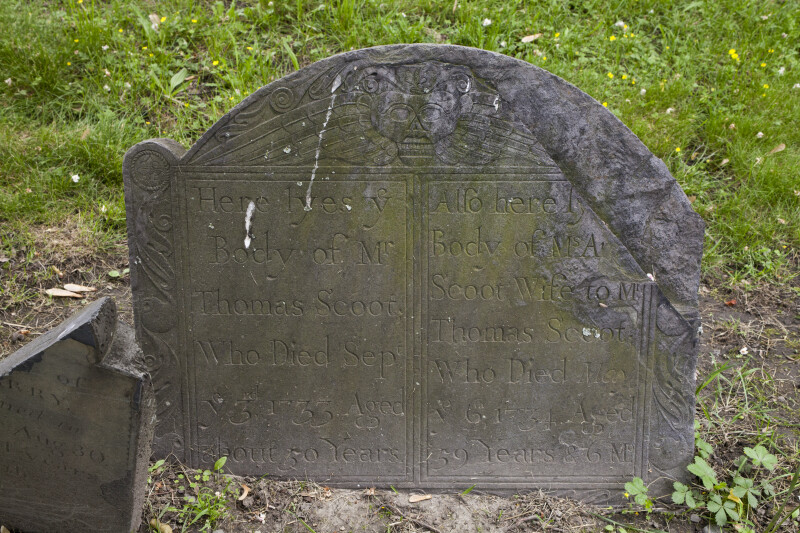 A Shouldered Tablet Headstone with A Death's Head Motif