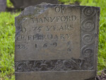 A Shouldered Tablet Headstone with Vertical and Horizontal Breaks