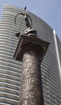 A Statue on Top of a Column