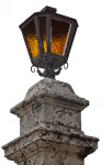 A Street Lamp on a Concrete Pillar