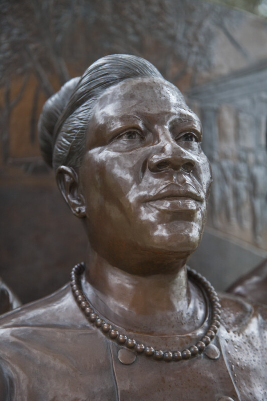 A Third Sculptural Figure on a Civil Rights Monument