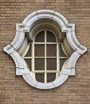 A Window with a Heavy Stone Frame