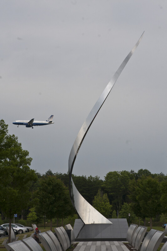 Airplane and "Ascent" Sculpture