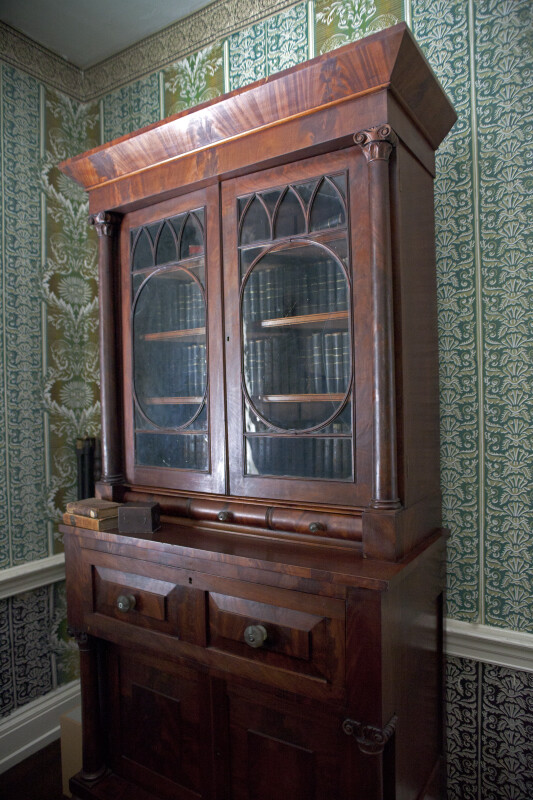 An Armoire or Secretary with Bookshelves