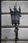 An Lamp with a Wrought Iron Sconce
