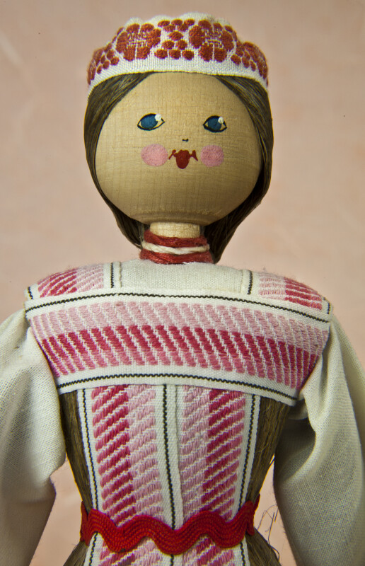 Belarus Lady from White Russia with a Wooden Bead for a Head and Hand Painted Facial Features (Close Up)