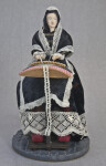 Belgium Figurine of Female Lace Maker Holding a Pillow, Bobbins, and Thread (Full View)