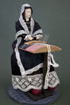 Belgium Lacemaker Doll Wearing Shawl, Dress, Scarf, and Apron Trimmed in Lace (Three Quarter View)